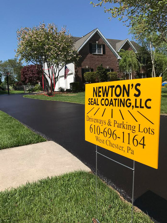 picture of newton sealcoating sign